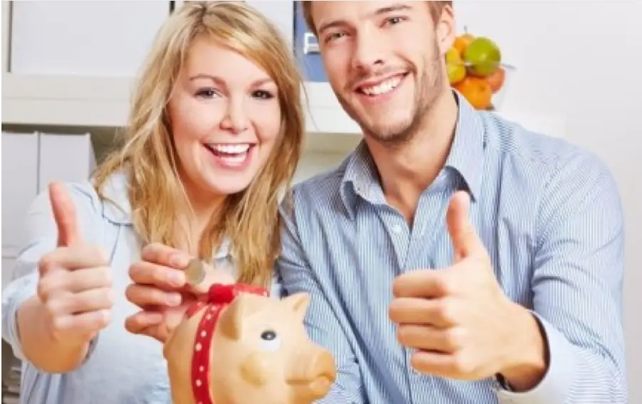 happy couple saving money